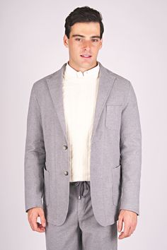 Our unlined, single-breasted blazer in stonewashed jersey cotton offers a sleek, modern silhouette. Perfect for transitioning from the office to all day events Classic Everyday Blazer With Hidden Button Closure, Classic Tailored Everyday Blazer, Classic Tailored Blazer For Everyday Wear, Classic Tailored Blazer, Everyday Tailored Single Breasted Blazer, Spring Unstructured Business Casual Blazer, Unstructured Spring Blazer For Business Casual, Everyday Cotton Blazer With Notch Lapel, Classic Sport Coat With Patch Pockets For Everyday