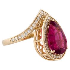 This elegant 14K yellow gold cocktail ring features a stunning 3.00 carat pear-shaped tourmaline that radiates a soft pink hue. The center stone is beautifully complemented by 54 round brilliant diamonds, totaling 0.35 carats, which encircle the tourmaline and extend down the band, adding a brilliant sparkle to the piece. The slightly included tourmaline enhances the ring’s unique charm, making it a sophisticated addition to any jewelry collection. With a band width of 2.1mm and an ornament length of 18.1mm, this ring offers a graceful and timeless design that will elevate any ensemble. Specifications: * SKU: SXNR-524 * Stock ID: RRING277613 * Metal Type: 14K Yellow Gold * Marks: 585, Maker's Mark * Total Item Weight: 5.3 grams * Size: 6.5 * Band Width: 2.1mm * Ornament Length: 18.1mm * Or Yellow Gold Cocktail Ring, Diamond Cocktail Ring, Rainbow Gemstones, Gold Cocktail Ring, Gold Cocktail, Diamond Cocktail Rings, Charm Making, Tourmaline Stone, Modern Ring