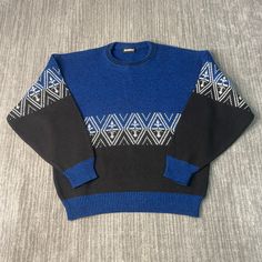 Vintage 90s Turnabout Abstract Design Diamonds Logo 1990s Fashion Basic Essentials Blue Knit Pullover Sweater Medium Mens *W16 Condition:  Excellent Used Condition  = No Flaws Measurements: Please see photos above for all measurements IF YOU BUY TWO OR MORE ITEMS USE THE CODE BUNDLE @ CHECK TO SAVE 20% WE SHIP WITHIN 24 HOURS AFTER PURCHASE! Please be aware that we do not offer free returns!! The Buyer is responsible for the cost of the return label. Follow us on TikTok & Instagram @findsnostalgic and tag us in your finds Retro Blue Knitted Sweater, Casual Blue Sweater With Fair Isle Pattern, Casual Blue Fair Isle Sweater, Blue Fair Isle Sweater For Cold Weather, 90s Style Knitted Winter Sweater, 90s Winter Knitted Sweater, 90s Knitted Winter Sweater, Retro Blue Long Sleeve Sweater, Blue Long Sleeve Retro Sweater