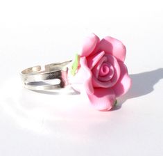 "A pretty pink rose ring Bright cheerful jewellery, a taste of summer all year long.  Each rose is around 1.5cm/3/4 inch in diameter and is on an adjustable silver tone ring  also available as earrings here: https://www.etsy.com/uk/listing/458826102/pink-rose-earrings-rose-dangle-earrings?ref=shop_home_active_1 also available as a necklace here: https://www.etsy.com/uk/listing/398802207/rose-dangle-earrings-necklace-set-flower?ref=shop_home_active_27 More rings here\" https://www.etsy.com/uk/sho Pink Flower Ring, Summer Jewellery, Summer Rings, Ring Flower, Clay Jewelry Diy, Rose Ring, Pink Ring, Rose Earrings, Flower Ring