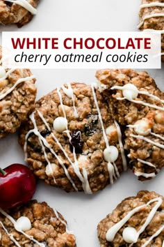 white chocolate cherry oatmeal cookies with drizzled on top and cherries