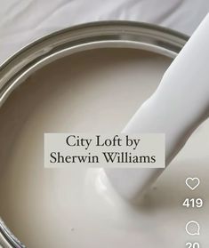 a close up of a paint can with the words city loft by sherylin williams on it