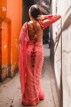 Peach pink saree with small flower booti made out of gotta patti in floral cutdana work. Comes with unstitched blouse piece
Components: 2
Pattern: Embroidered
Type Of Work: Floral
Fabric: Chiffon
Color: Peach, Pink
Other Details: 
Floral embroidery
Blouse Piece: 1 Mtrs
Note: The stitched blouse worn by the model is not for sale
Occasion: Destination Wedding - Aza Fashions Anarkali Blouse With Gota Work In Georgette, Pink Gota Work Blouse For Festivals, Navratri Gota Work Georgette Blouse, Navratri Peach Blouse Piece With Pallu, Peach Blouse Piece With Pallu For Navratri, Festival Gota Work Georgette Blouse, Pink Bollywood Blouse With Gota Work, Pink Blouse With Gota Work For Wedding, Bollywood Pink Blouse With Gota Work