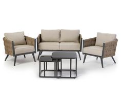 an outdoor furniture set with four chairs, two tables and one coffee table in front of it