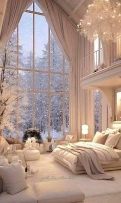 an elegant bedroom with large windows, white furniture and chandelier hanging from the ceiling