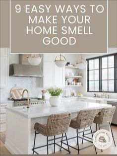 a kitchen with white cabinets and an island in the middle, text reads 9 easy ways to make your home smell good