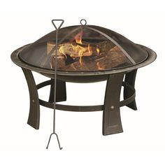 an outdoor fire pit with metal legs