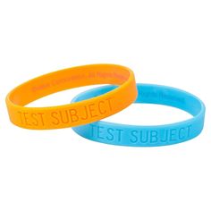 Show off your love of Portal with this rubber bracelet set! Orange and blue bracelets read "Test Subject". Includes 2 bracelets. Great for costume or everyday wear. Makes a great gift for the Portal fan - or yourself! Makes a great stocking stuffer as well. Test Subject, Blue Bracelets, Fall Socks, Aperture Science, Portal 2, Kids Dress Up, Rubber Bracelets, The Portal, Up Costumes