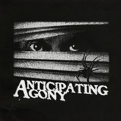 a black shirt with an image of a woman's face and the words anticapping