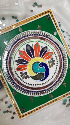 an artistically designed tray with colorful designs on it