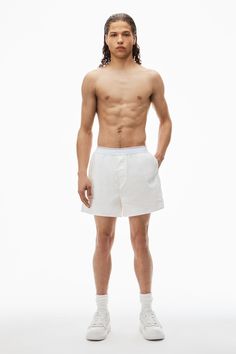 crafted of cotton, this relaxed-fit boxer in white features a logo patch at the hem. relaxed fit elastic waistband body composition: 100% cotton trim: 47% polyester/30% cotton/14% nylon/9% elastane made in china model is 5’10 and wears a size xs COMPOSOTION: body/exterieur: 91%cotton/9%elastane lining: 91%cotton/9%elastane elastic: 47%polyester/30%cotton/14%nylon/9%elastane UWC2248165001 Casual Boxer Briefs With Logo Waistband For Loungewear, Casual Logo Waistband Boxer Briefs For Loungewear, Sporty White Boxer Briefs With Built-in Shorts, Summer Cotton Boxer Briefs For Daywear, Sporty Cotton Shorts For Daywear, Sporty Summer Boxer Briefs With Logo Waistband, Sporty Relaxed Fit Cotton Boxer Briefs, Sporty Summer Boxer Briefs With Short Inseam, White Cotton Boxer Briefs