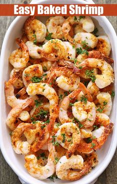 baked shrimp in a white dish with parsley on top and the title above it