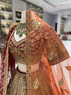 Elevate your bridal look with our Maroon Multi Color Bridal Lehenga BL-128, featuring intricate patch work and paired with beautiful heavy maroon dupta and rust orange dupta. Complete your dreamy ensemble with this unique and stunning lehenga. (Dreams do come true!) Fabric: Net with Raw Silk Lining! WASH CARE INSTRUCTIONS - Please Dry clean only when it is applicable! Ready to Ship! Bollywood Style Multicolor Sharara With Intricate Embroidery, Bollywood Style Multicolor Sets With Intricate Embroidery, Multicolor Lehenga With Intricate Embroidery For Festive Occasions, Designer Multicolor Lehenga With Zari Work, Designer Multicolor Lehenga With Intricate Embroidery, Multicolor Embroidered Lehenga For Designer Wear, Designer Multicolor Embroidered Lehenga, Anarkali Lehenga With Intricate Embroidery In Multicolor, Anarkali Multicolor Lehenga With Intricate Embroidery