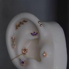 the ear is adorned with many different jewels