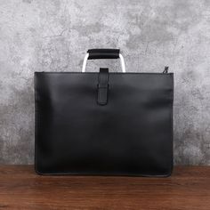 SPECIFICATIONSStyle: BusinessSize: 14 inchesPattern Type: SolidOrigin: CN(Origin)Number of Handles/Straps: SingleMaterial Composition: genuine leatherMain Material: GENUINE LEATHERLining Material: polyesterItem Width: 1cmItem Weight: 1kgItem Type: BriefcasesItem Length: 37cmItem Height: 27cmHandle/Strap Type: Soft HandleGenuine Leather Type: Cow LeatherGender: UnisexLeather Shoulder Bag / HandbagMaterial: 100% Natural CowskinCrazy horse leatherDesign 2 : Soft Red BrownSoft Dark BrownSoft Black Leather Business Bag, Leather Computer Bag, Laptop Handbag, Business Briefcase, Leather Briefcase Men, Work Handbag, Luxury Clutch, Work Tote Bag, Computer Bag