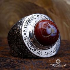 "✦ We prepared the silver body as handmade and embroidered handcrafted motifs around it. Our ring stone is Yemen Agate, eye agate known as Süleyman agate and measures 13-14 mm. We wrote the \"Nazar Duası / Evil Eye Prayer\" on a 4 mm line around the stone with Nesih Calligraphy. ✎ For personalization, we can write any text or name you want on the inside of your ring. Or you can also change the patterns on your ring or symbol in the middle of ring. 'Thanks to our vast experience in jewelry making, we, as TAKIDASANAT handmade designers, design our own ring designs with precious natural stones and special writing style where aesthetics come to the fore and you also participate in this design process and turn ring into a work of art by choosing personalized inscriptions, patterns and stones.. Unique Silver Rings, Cross Wreath, Brown Agate, Silver Bodies, Signet Rings, Evil Eye Ring, Etsy Personalized Gifts, Eye Ring, Yemen