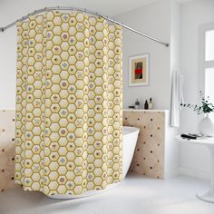 a bathroom with a yellow and white shower curtain