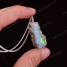 Please Note : Due to natural rough opal gemstone nature every stone is unique so you may be received different or approx similar gemstone from the depict pictures, depict pictures are for quality and size. & fire reference purpose only.)) *Stone Name : Natural Raw Opal *Size : Approx 10 to 20mm *Quantity : 1 Pendant Necklace *Shape : Rough *Country Of Origin : Ethiopia *Quality : AA+ *Gemstone Type : Natural *Healing : Opal has a generally health enhancing effect because it strengthens the w Opal Necklace With Natural Stones As Gift, Opal Necklace With Natural Stones For Gift, Opal Gemstone Crystal Necklace Gift, Gift Jewelry With Ethiopian Opal And Natural Stones, Ethiopian Opal Jewelry With Natural Stones As Gift, Opal Jewelry With Natural Stones As A Gift, Opal Jewelry With Natural Stones For Gift, Opal Jewelry Gift, Unique Ethiopian Opal Necklace Gift