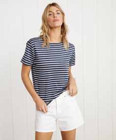 Rue Striped Tee White Stripe Introducing Saint James x Jenni Kayne: elevated basics, from France to LA. Based off of Saint James' iconic striped tees, our exclusive collection fuses French classics with California cool, bringing you a timeless and enduring staple that you'll happily style through every season. 98% linen, 2% elastane. Made in Saint-James, Normandy, France. Linen produced in the Pas-de-Calais region of Northern France in the village of Sailly-les-Lys. Linen softens over time. Wash Everyday Crew Neck T-shirt With Vertical Stripes, Everyday Horizontal Stripe Crew Neck T-shirt, Classic Crew Neck Tops With Horizontal Stripes, Summer Striped Hem Relaxed Fit T-shirt, Summer Relaxed Fit T-shirt With Striped Hem, Everyday Short Sleeve Tops With Vertical Stripes, Classic Crew Neck Top With Striped Hem, Relaxed Fit Striped Hem T-shirt For Summer, Striped Relaxed Fit Tops For Everyday