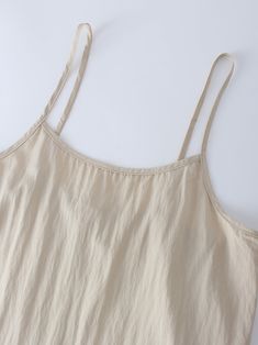 Designed with comfort and style in mind, our Crinkle Cotton Slip Dress-Tan is a must-have. This dress provides a lightweight and breathable option for everyday wear. Casual Solid Wrinkled Dress, Casual Wrinkled Dress, Casual Crinkle Texture Vacation Dress, Casual Neutral Summer Dress, Neutral Summer Loungewear Dress, Casual Sleeveless Dress With Crinkle Texture, Teen Skirts, Crinkle Cotton, Cotton Slip