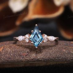 Unique London Blue Topaz Engagement Ring Vintage Rose Gold Marquise Moissanite Wedding Ring December Birthstone Ring Bridal Rings For Women RING DESCRIPTION ✦Engagement Ring ✴Center Stone - London Blue Topaz Shape - Kite Cut Size - 6*9mm ✴Side Stones - Moissanite Shape - Round & Marquise Cut Weight - About 0.34ct ✴Band Width - About 1.6mm ✴Ring Metal: Available in rose gold plated, yellow gold plated, 925 sterling silver, 10k or 14k solid rose, yellow or white gold. MAKING & SHIPPING ✦PAYMENT PL December Birthstone Engagement Rings, Victorian Wedding Ring, Sparkly Rings, London Blue Topaz Engagement Ring, Birthstone Engagement Rings, Moissanite Wedding Ring Set, Rose Gold Engagement Ring Vintage, December Birthstone Ring, Blue Topaz Engagement Ring