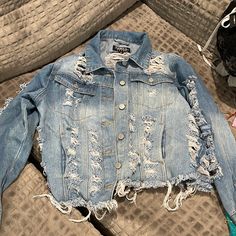 Size Med Never Worn Blue Ripped Winter Outerwear, Winter Ripped Blue Outerwear, Winter Blue Ripped Outerwear, Spring Grunge Outerwear With Frayed Hem, Ripped Blue Long Sleeve Outerwear, Ripped Blue Outerwear For Fall, Fitted Ripped Blue Outerwear, Distressed Jacket, Jean Top