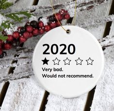 a white ceramic ornament with the words, 2020 very bad would not recommend