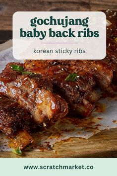 korean baby back ribs on a cutting board with the words gochuang baby back ribs