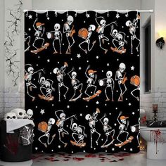 a halloween themed shower curtain with skeletons and basketballs in the air on black background