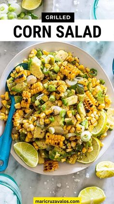 grilled corn salad with limes and cilantro on the side