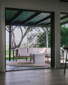 an open living room with sliding glass doors