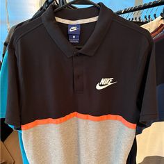 Never Worn Nike Polo For Tennis Or Golf Large Black/Gray/Orange. Nike Orange Sports Top, Sporty Black Cotton Polo Shirt, Black Cotton Sporty Polo Shirt, Black Color Block Tops For Sports, Gray Cotton Polo Shirt For Sports, Nike Casual Orange Tops, Casual Nike Cotton Polo Shirt, Casual Nike Orange Tops, Casual Orange Nike Tops