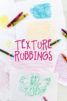 some crayons are laying on top of paper with the words texture rubbings