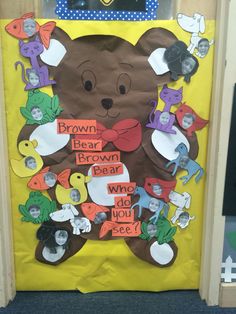 a door decorated with brown bear pictures and words