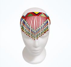 100 % Handmade with fine beads. One size fits most, Beaded Zulu tassel necklace that can also be worn as a head band. The band is multicolored and the tassel has a solid color with a finish of different colors. We have five solid colors for the tassel, Red, Orange, Blue, white and yellow. Made in South Africa, Durban. Bohemian Beaded Festival Headband, Adjustable Beaded Bohemian Headband, Adjustable Bohemian Beaded Headband, Beaded Headband For Festivals, Beaded Festival Headband, Festival Beaded Headband, Adjustable Festival Headband, Adjustable Beaded Bohemian Headpiece, Traditional Multicolor Handmade Headband