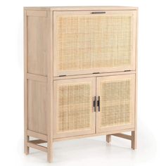 a wooden cabinet with two doors and wicker panels on the front, against a white background