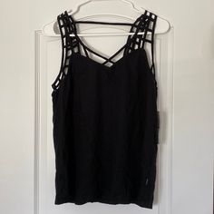 Bnwt Black Rvca Tank Top. Perfect Top For Going Out In! Fun Detailed Straps. Flowy Material. Size Small. Edgy Workout Tank Top For Summer, Edgy Workout Tops For Summer, Edgy Summer Workout Tops, Casual Black Tank Top For Vacation, Edgy Black Tank Top For Workout, Trendy Black Tank Top For The Beach, Trendy Black Tank Top For Beach, Edgy Summer Workout Tank Top, Black Tank Top With Adjustable Straps