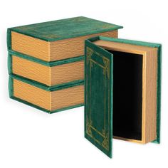 three books stacked on top of each other with one open book in the middle and another closed