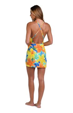 This bright and cheerful floral print has a summery vibe, perfect for a beach day. This short pareo features a one-size-fits-all design which provides a custom fit, and the side tie keeps everything undercover. [split] Details Short pareo cover up Adjustable wrap tie Tassel trim One size fits all Fabric 100% Rayon Crepe Multicolor Mini Beach Dress For Vacation, Multicolor Mini Length Beach Dress For Vacation, Multicolor Beachy Dress For Poolside, Mini Length Beachwear Swimwear, Casual Multicolor Sarong For Beach Season, Spring Beach Party Swimwear With Vibrant Print, Vibrant Swimwear For Summer Beach Cover-up, Summer Tropical Print Swim Dress For Poolside, Summer Style Tropical Print Swim Dress For Poolside