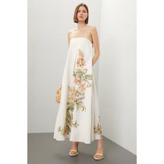 Off-white floral (100% Linen). Casual dress. Sleeveless. Strapless. Side zipper closure. 57" from shoulder to hemline. Imported. Floral Print Sundress With Straight Neckline For Brunch, Floral Print Sundress With Straight Neckline For Day Out, Floral Sundress With Straight Neckline For Day Out, Summer Maxi Dress With Floral Print And Straight Neckline, Strapless Sleeveless Dress For Spring Garden Party, Floral Print Sundress With Straight Neckline, Summer Floral Print Strapless Midi Dress, Spring Strapless Sundress With Straight Neckline, Spring Strapless Dress With Straight Neckline For Brunch