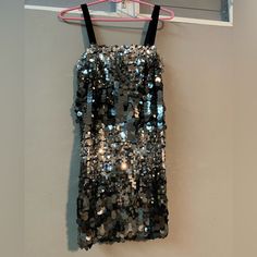 Zara Sequin Mini Dress. Beautiful! Silver Sequins Of Varying Sizes. Velvet Straps, Zipper On Side, Fully Lined, No Stretch. Never Worn. I Dont Know What I Was Thinking. I Was Obsessed With An Alice And Olivia Sequined Skirt ($300+!!!), Saw This Beauty And Got It! I Was Obviously Star Struck And Delusional Because This Thing Was Never Gonna Fit These Hips. My Loss, Your Gain Gray Sleeveless Mini Dress For Night Out, Gray Mini Party Dress, Gray Mini Dress For Evening, Gray Mini Dress For Night Out, Zara Pleated Dress, Combination Dresses, Sequined Skirt, Amanda Uprichard Dress, Star Struck