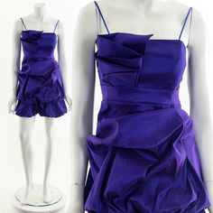 "- 2000s - deep purple formal dress - sleeveless - ruffly tired texture - zipper back closure - lined - stretchy - ribbed Brand/Designer/Label: City Studio Tag Size: S Fits like: XS - S Material: Polyester, nylon, spandex Condition: Excellent Clipped on Mannequin: No ✂ S I Z E + F I T ✂ Length: 32\" / 81 cm Shoulders, seam to seam: 12\" / 30 cm Bust: 30\" / 76 cm Waist: 28\" / 71 cm Hips: 34\" / 86 cm All measurements are taken with garment lying flat. ALWAYS refer to measurements as vintage siz Fitted Purple Pleated Mini Dress, Formal Purple Ruffled Mini Dress, Purple Formal Dress, Origami Dress, Dress Form Mannequin, Designer Label, 90s Dress, Cocktail Party Dress, Studio City