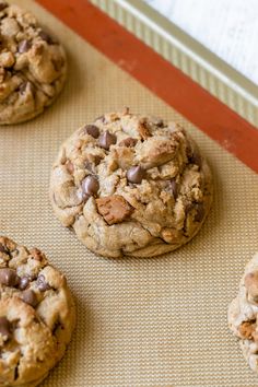 chocolate chip cookies on a baking sheet ready to be baked in the oven or eaten