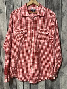 Vintage Cherokee red gingham button up shirt. Size large. 55% cotton, 45% polyester. Made  in Bangladesh. Spring Cotton Collared Flannel Shirt, Classic Summer Flannel Button-up Shirt, Classic Summer Button-up Flannel Shirt, Summer Cotton Button-up Flannel Shirt, Casual Gingham Cotton Flannel Shirt, Classic Spring Flannel Shirt With Button Closure, Classic Flannel Shirt With Button Closure For Spring, Collared Cotton Flannel Shirt For Summer, Summer Cotton Flannel Shirt With Button Closure