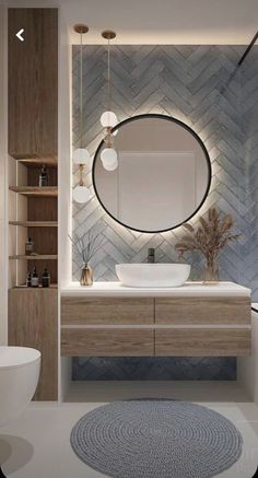 a bathroom with a round mirror above the sink