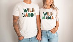 a man and woman standing next to each other wearing matching tshirts that read big boy papama