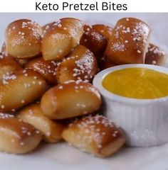 a plate full of pretzel bites with dipping sauce