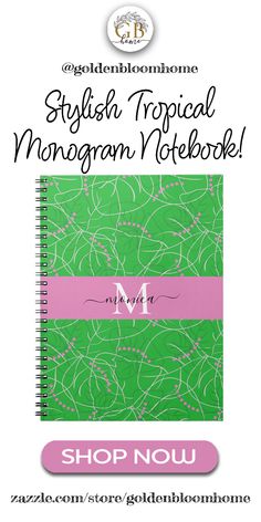 a green notebook with pink ribbon and the words, english tropical monogramn notebook