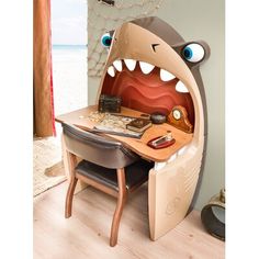 a desk with a shark head on it