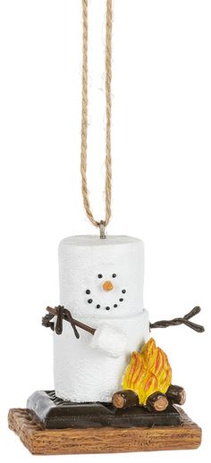 a toilet paper snowman ornament hanging from a rope